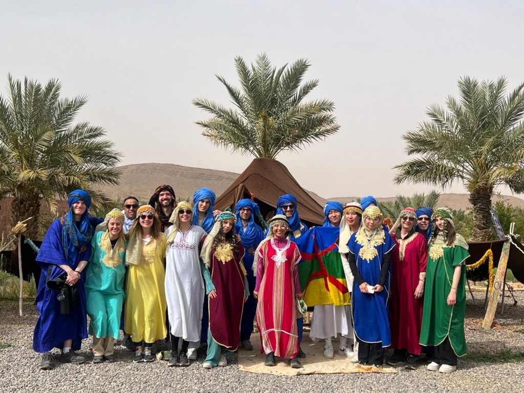 The Morroco desert tour group dressed up in traditional clothing.